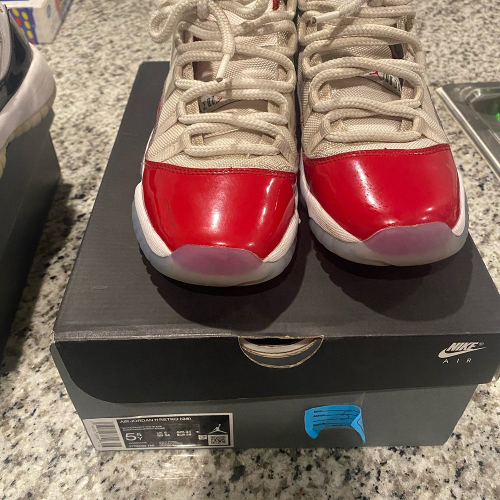 Jordan Red and White Sneakers with Glossy Finish
